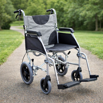 Lightweight Folding Transit Wheelchair – 115kg Capacity – Adjustable & Portable